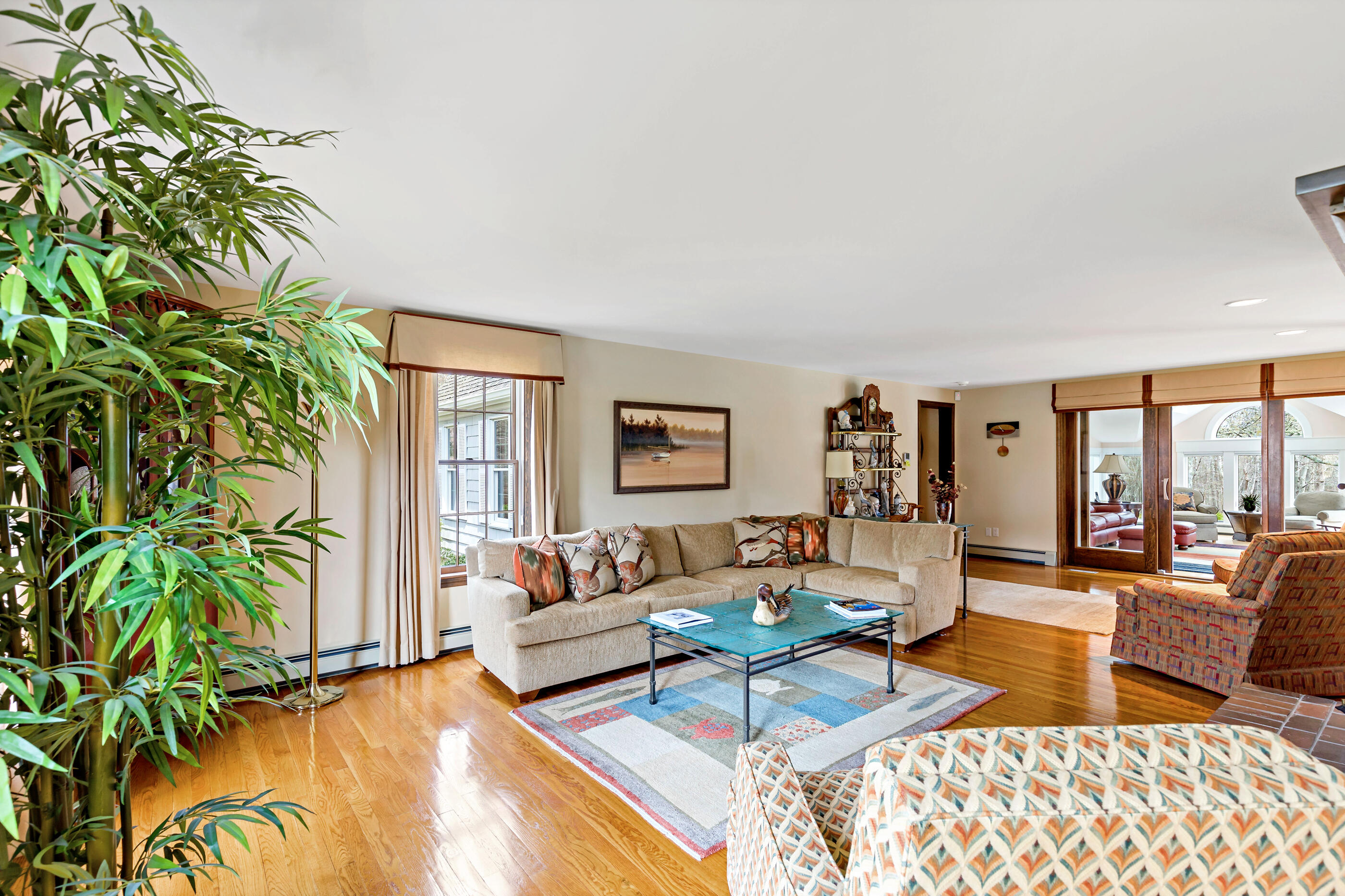 5 Shepherds Quay Brewster, MA 02631 - Photo 28 of 67 a living room with furniture and a potted plant