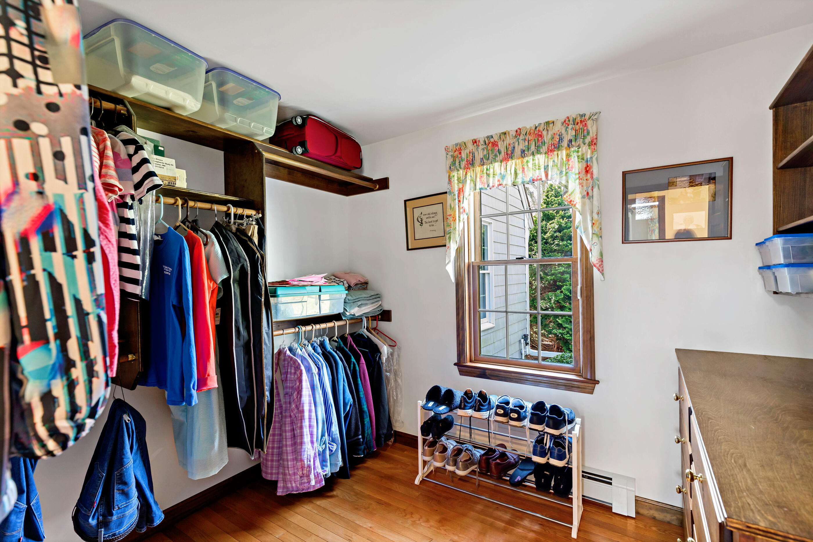 5 Shepherds Quay Brewster, MA 02631 - Photo 55 of 67 a view of walk in closet with clothes and shoes