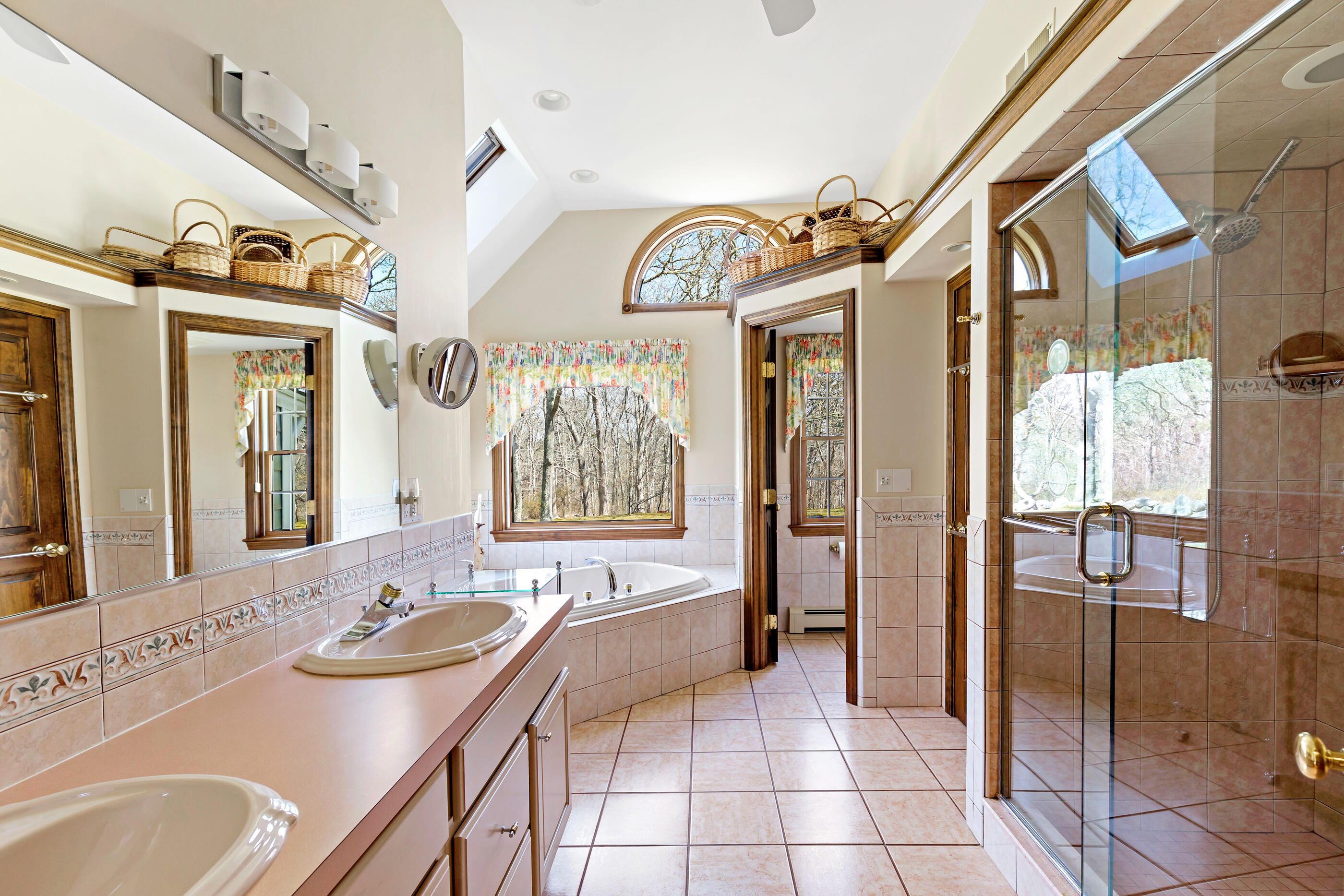5 Shepherds Quay Brewster, MA 02631 - Photo 57 of 67 a spacious bathroom with a sink a mirror and a shower