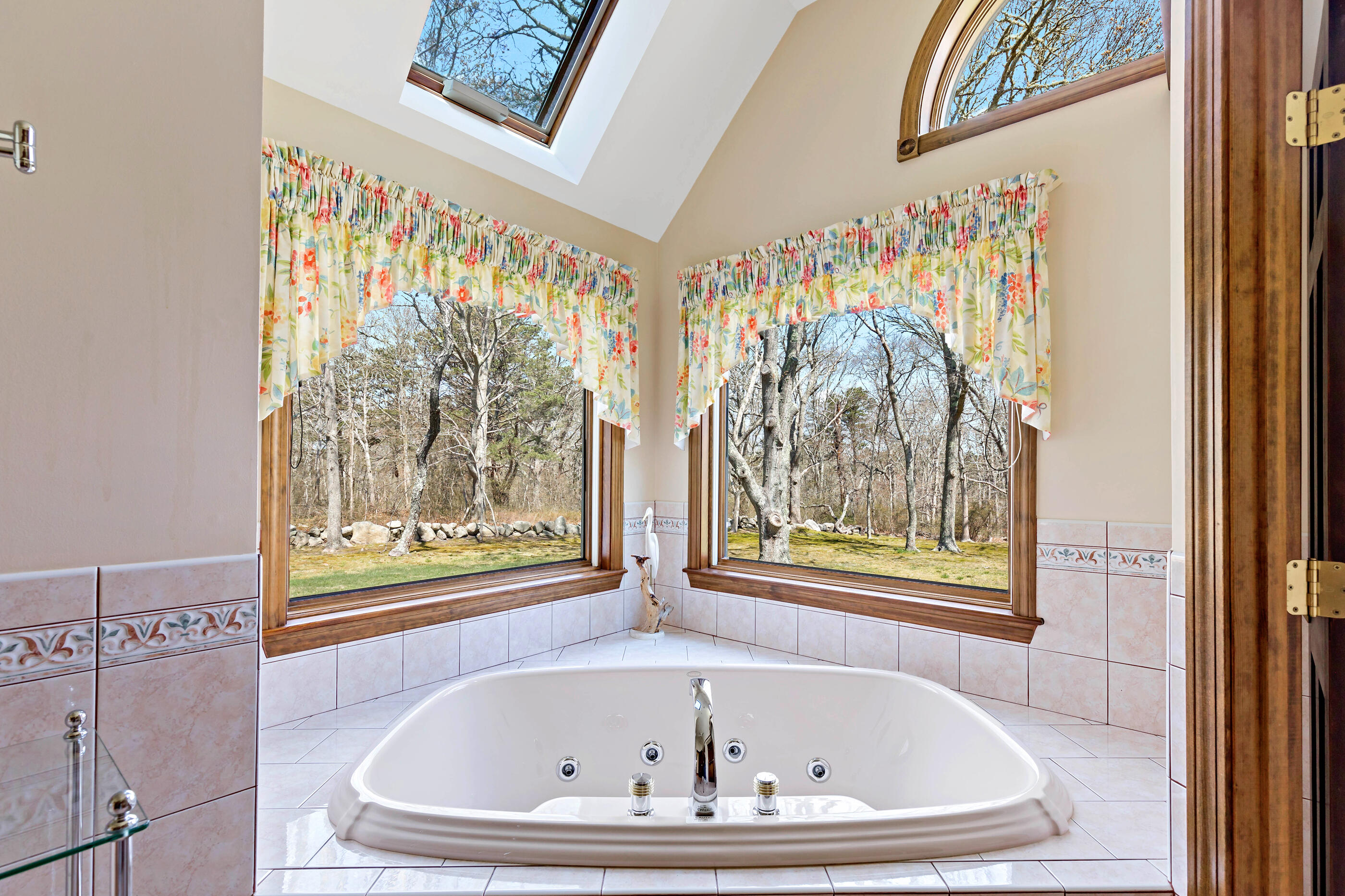 5 Shepherds Quay Brewster, MA 02631 - Photo 58 of 67 a white bath tub sitting in a bathroom next to a window