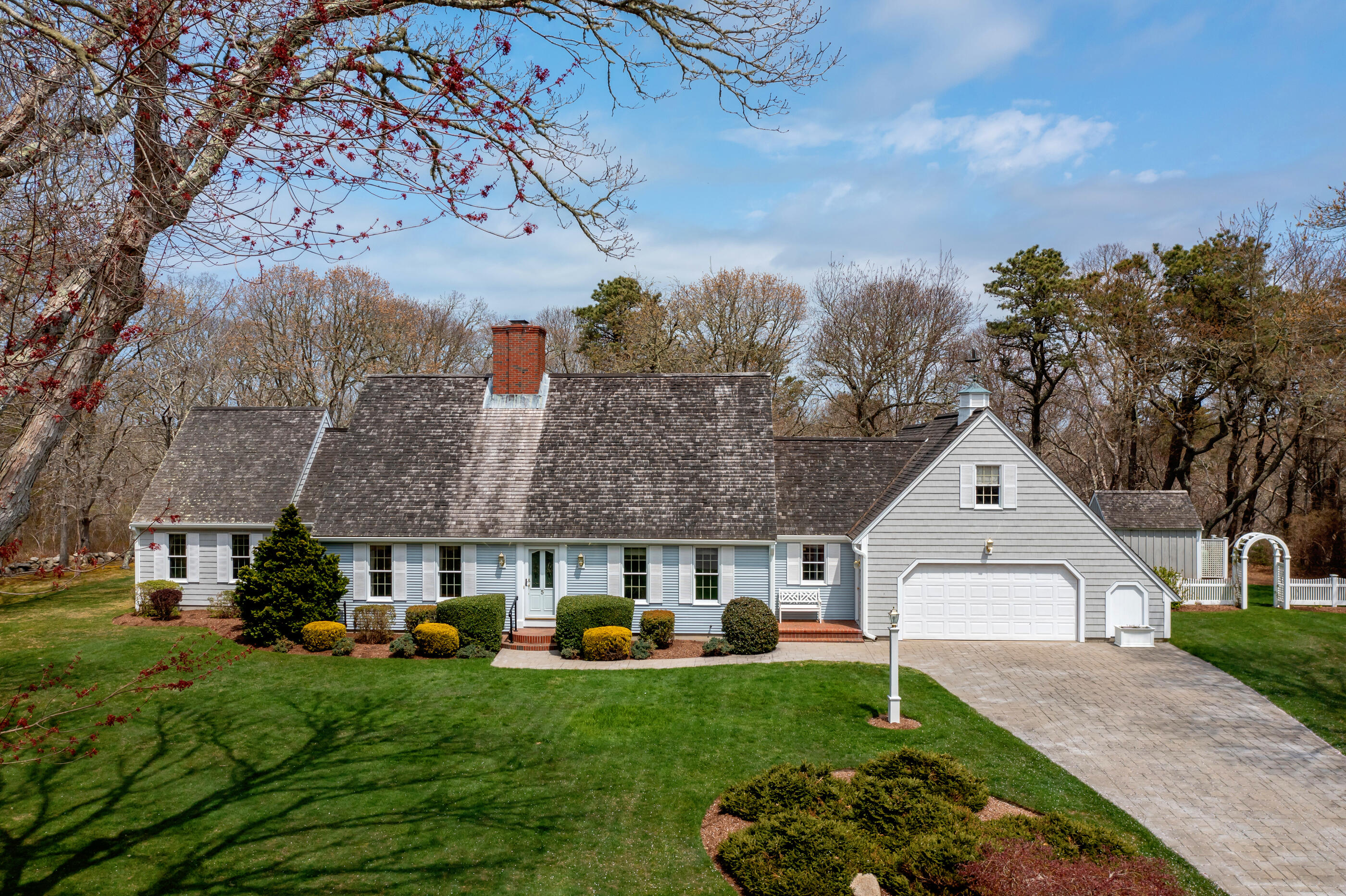 5 Shepherds Quay Brewster, MA 02631 - Photo 6 of 67 a front view of a house with garden