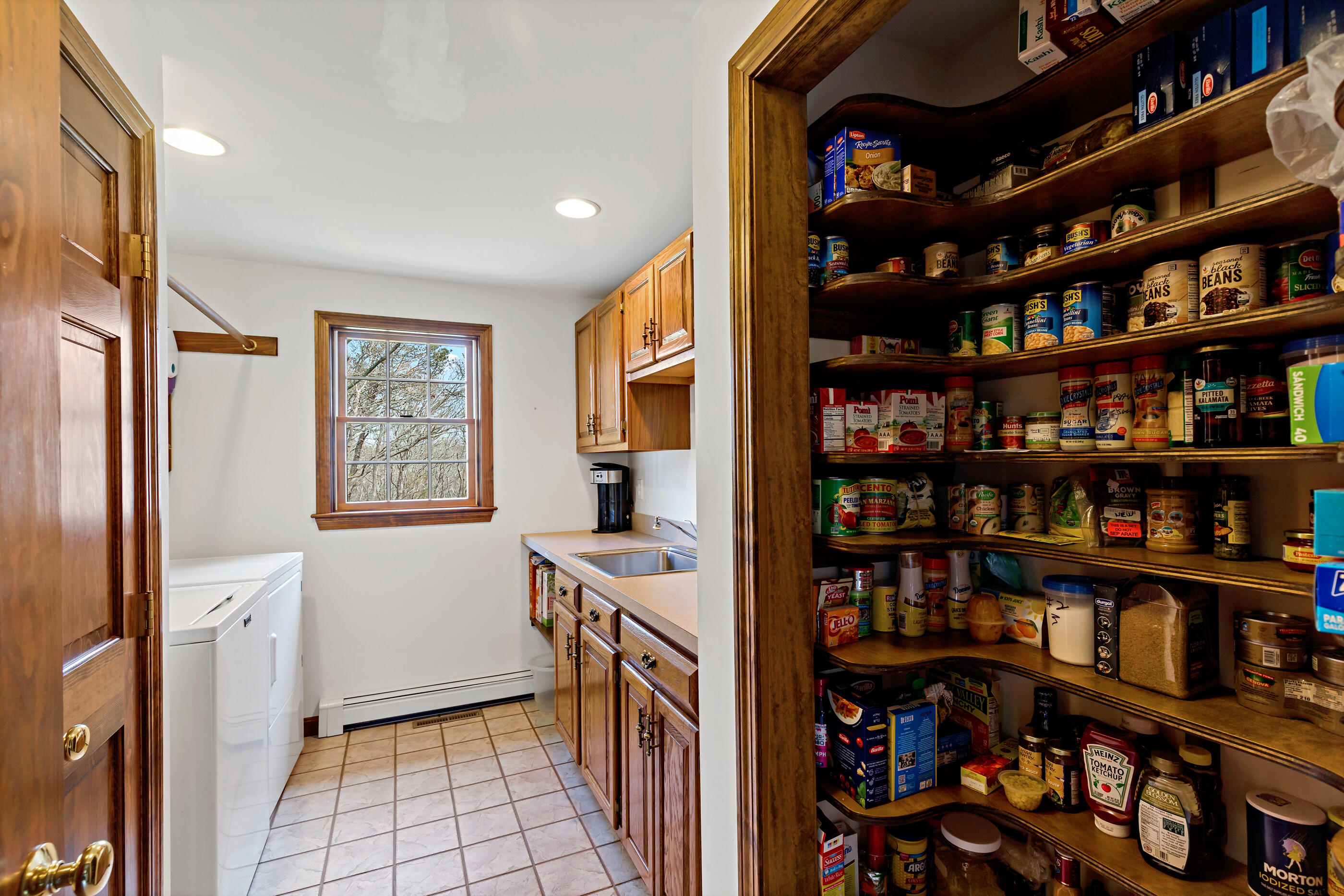 5 Shepherds Quay Brewster, MA 02631 - Photo 64 of 67 a view of a livingroom with shelves