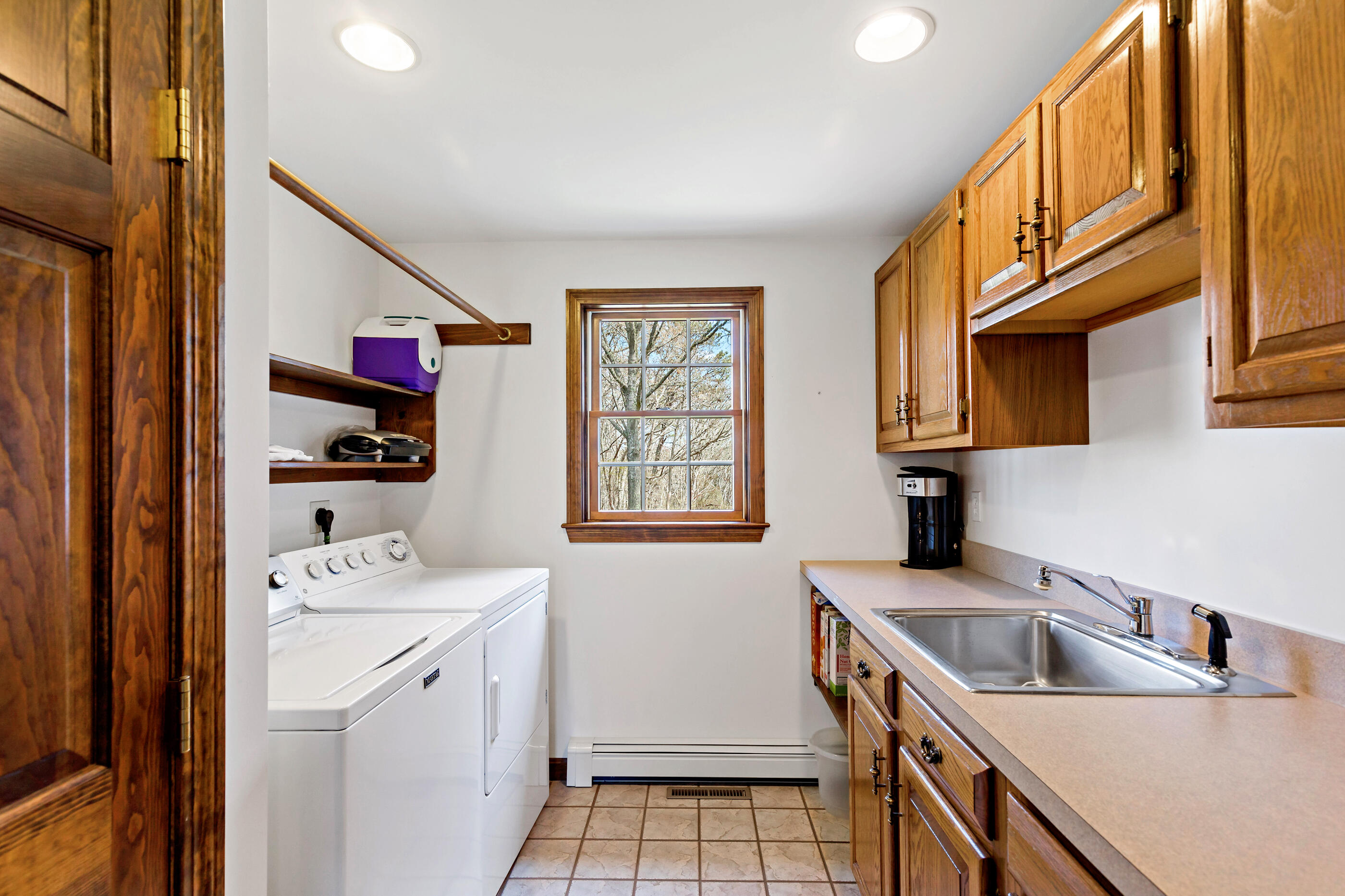 5 Shepherds Quay Brewster, MA 02631 - Photo 65 of 67 a kitchen with stainless steel appliances granite countertop a sink dishwasher and cabinets with wooden floor