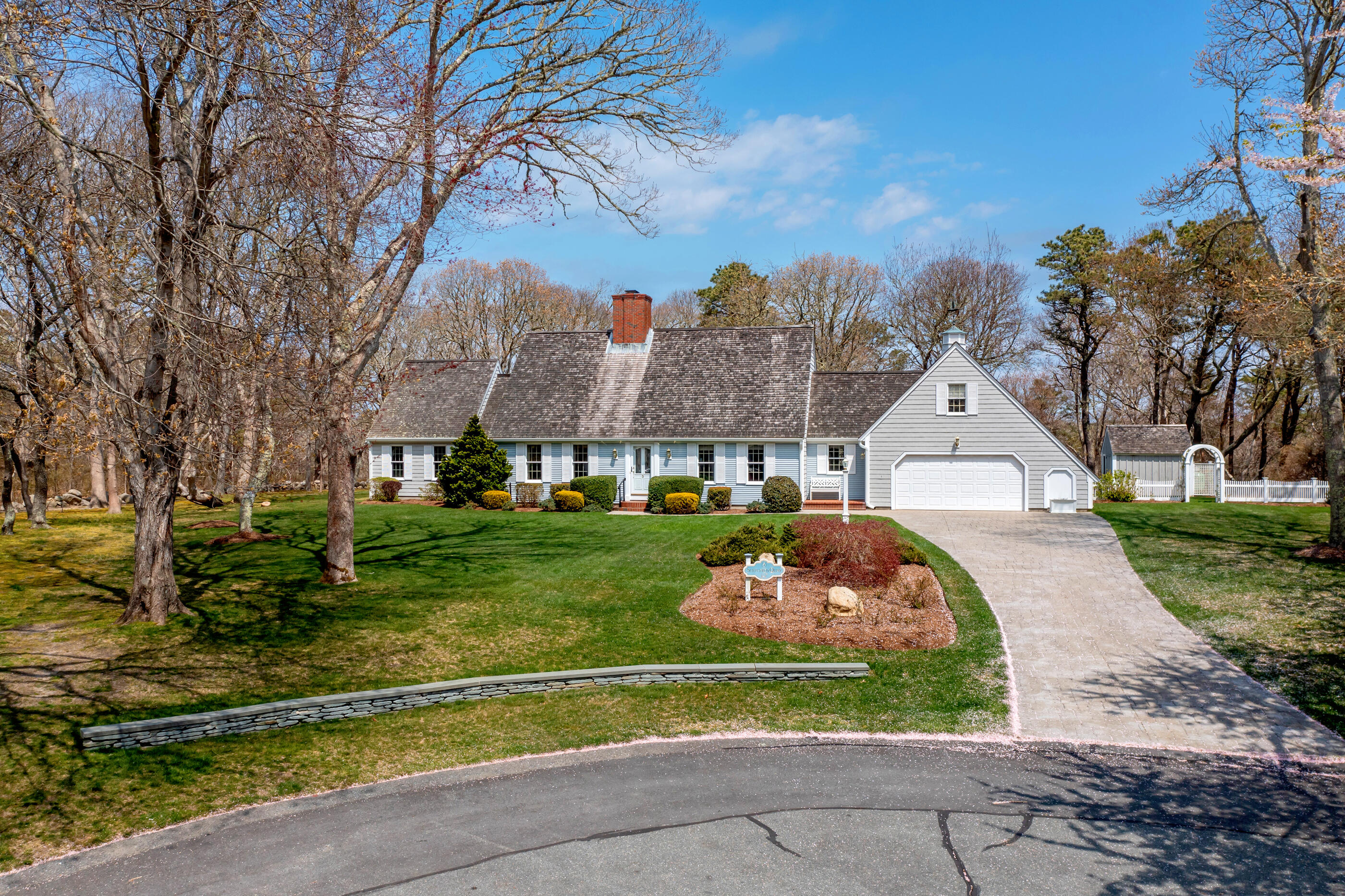 5 Shepherds Quay Brewster, MA 02631 - Photo 8 of 67 a front view of a house with garden