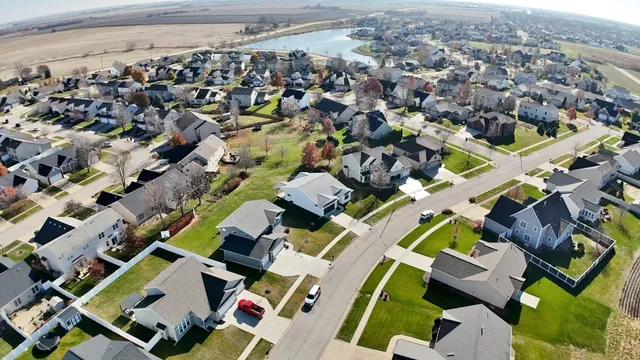 a view of kitchen and utility room with wooden floor