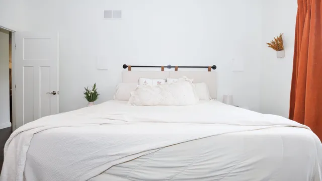 a bathroom with a sink vanity and mirror