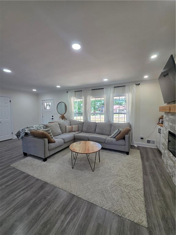 150 Sims Street Winder, GA 30680 - Photo 6 of 61 a living room with furniture and a large window
