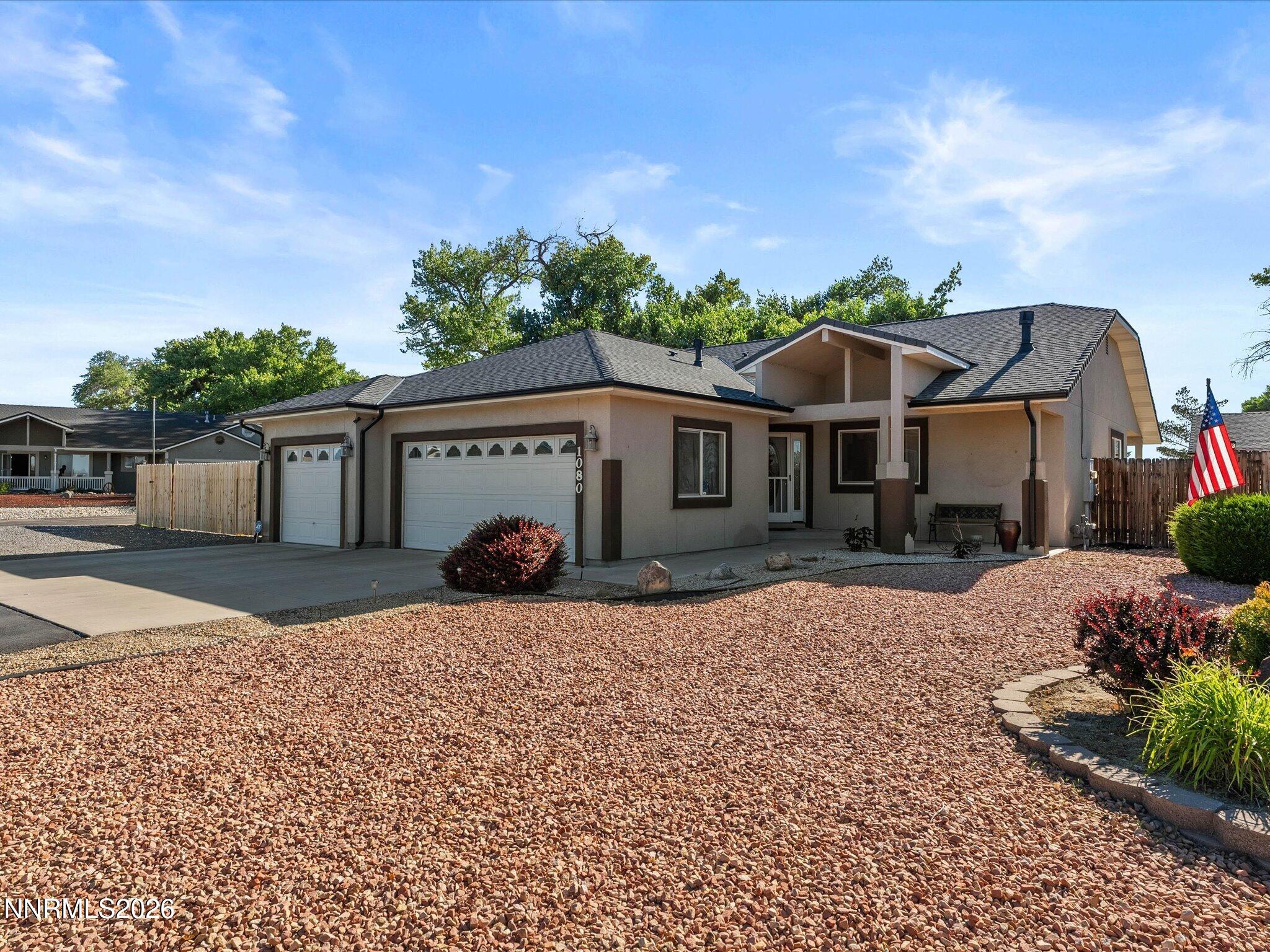 1080 Red Rock Road Fernley, NV 89408 - Photo 5 of 45 a view of a house with a patio