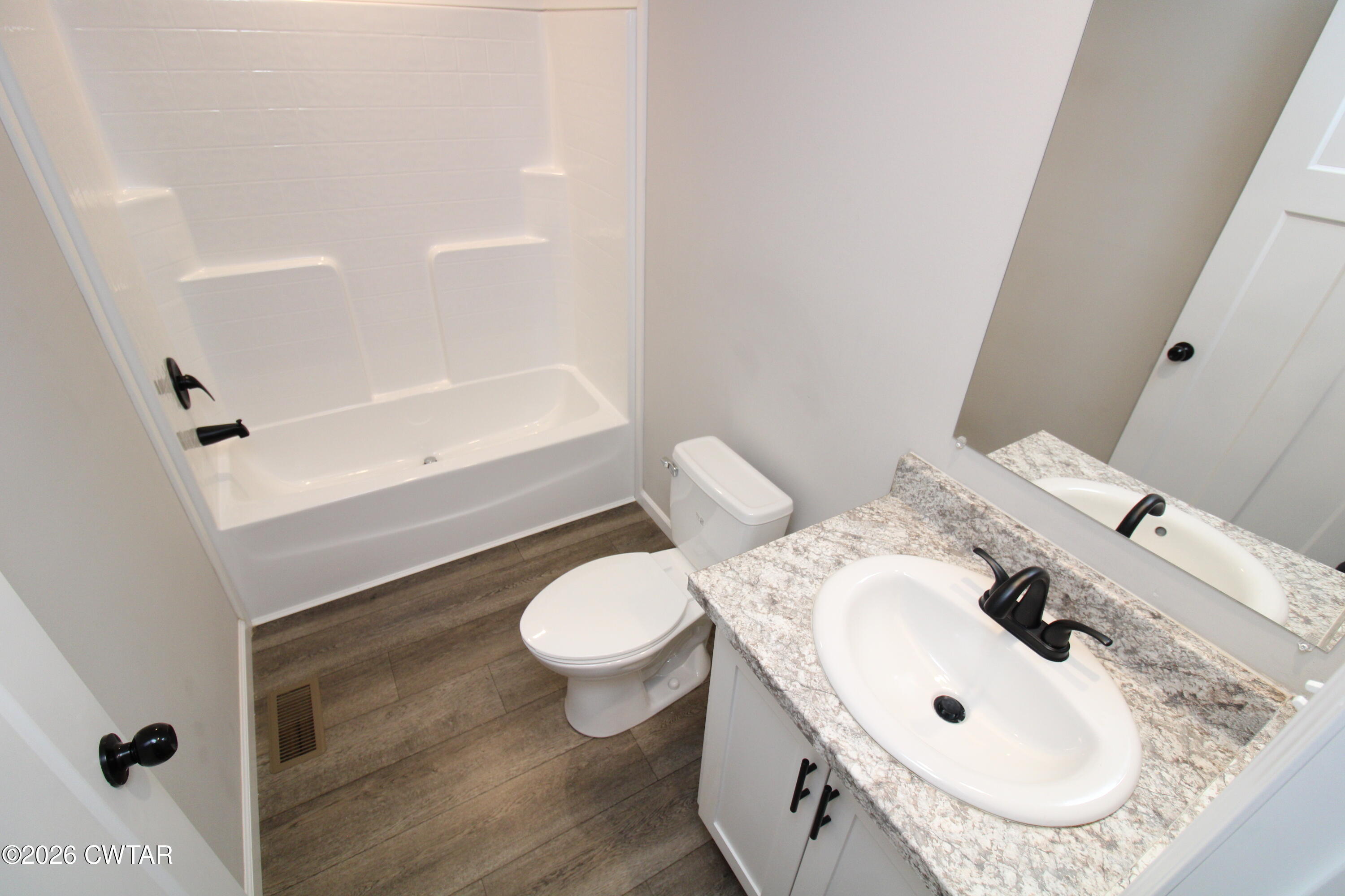 398 Pope Road Lexington, TN 38351 - Photo 16 of 21 a bathroom with a sink and a mirror