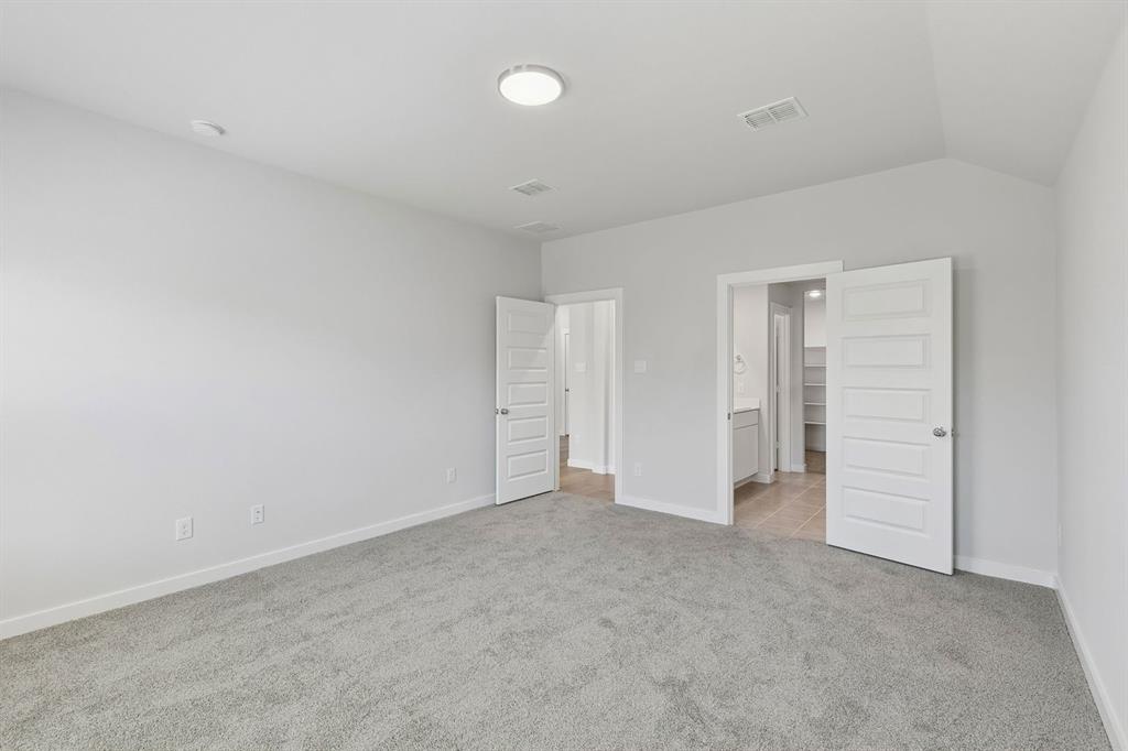 769 Sierra Ridge Lavon, TX 75166 - Photo 21 of 37 Primary Suite in the Harrison home plan by Trophy Signature Homes – REPRESENTATIVE PHOTO