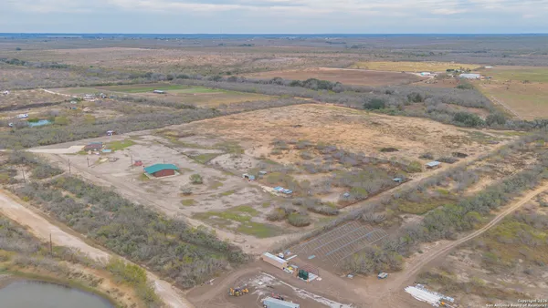 a view of patio and yard