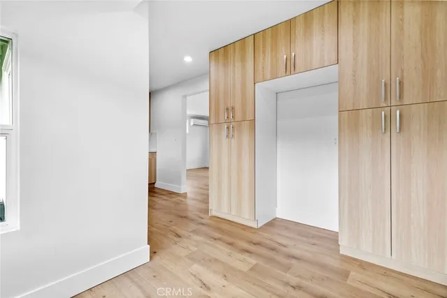 a view of a kitchen from the hallway