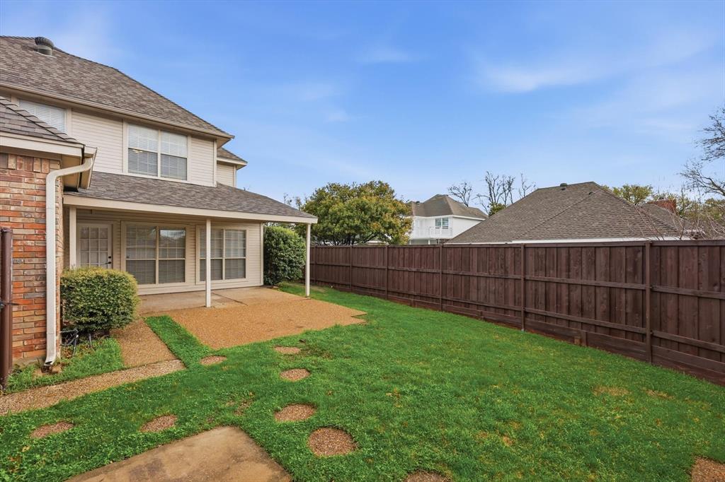 4350 Timberglen Road Dallas, TX 75287 - Photo 27 of 33 Fenced backyard featuring a patio