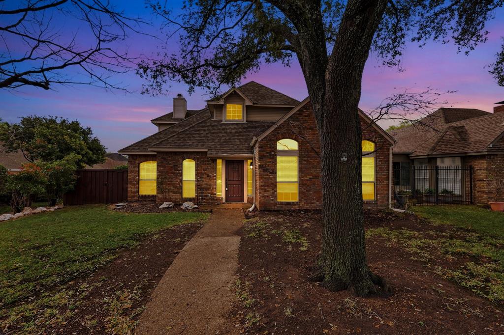 4350 Timberglen Road Dallas, TX 75287 - Photo 29 of 33 Traditional home featuring brick siding, a shingled roof, and a chimney
