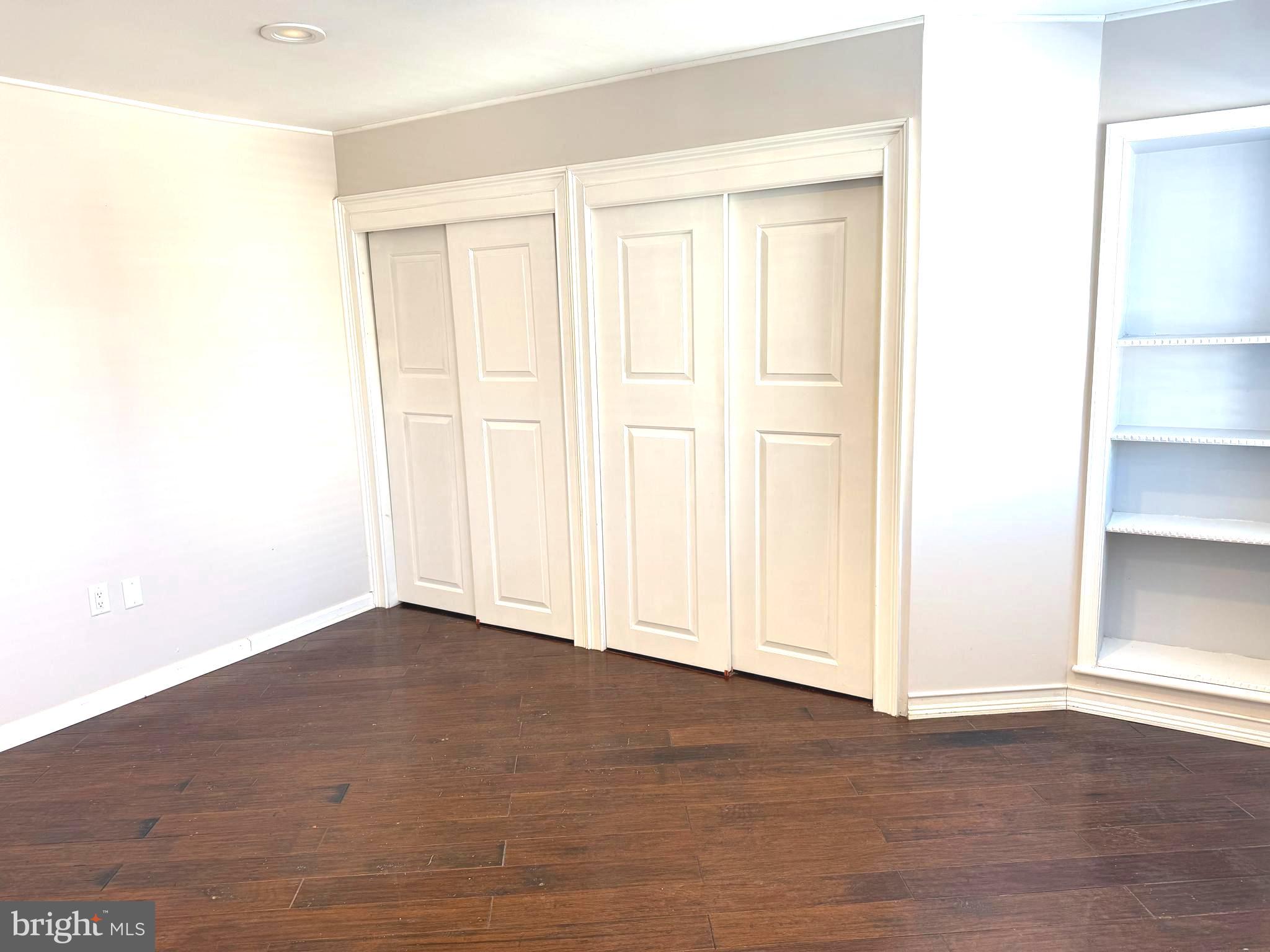 1512 West Shunk Street Philadelphia, PA 19145 - Photo 2 of 10 a view of an empty room with wooden floor