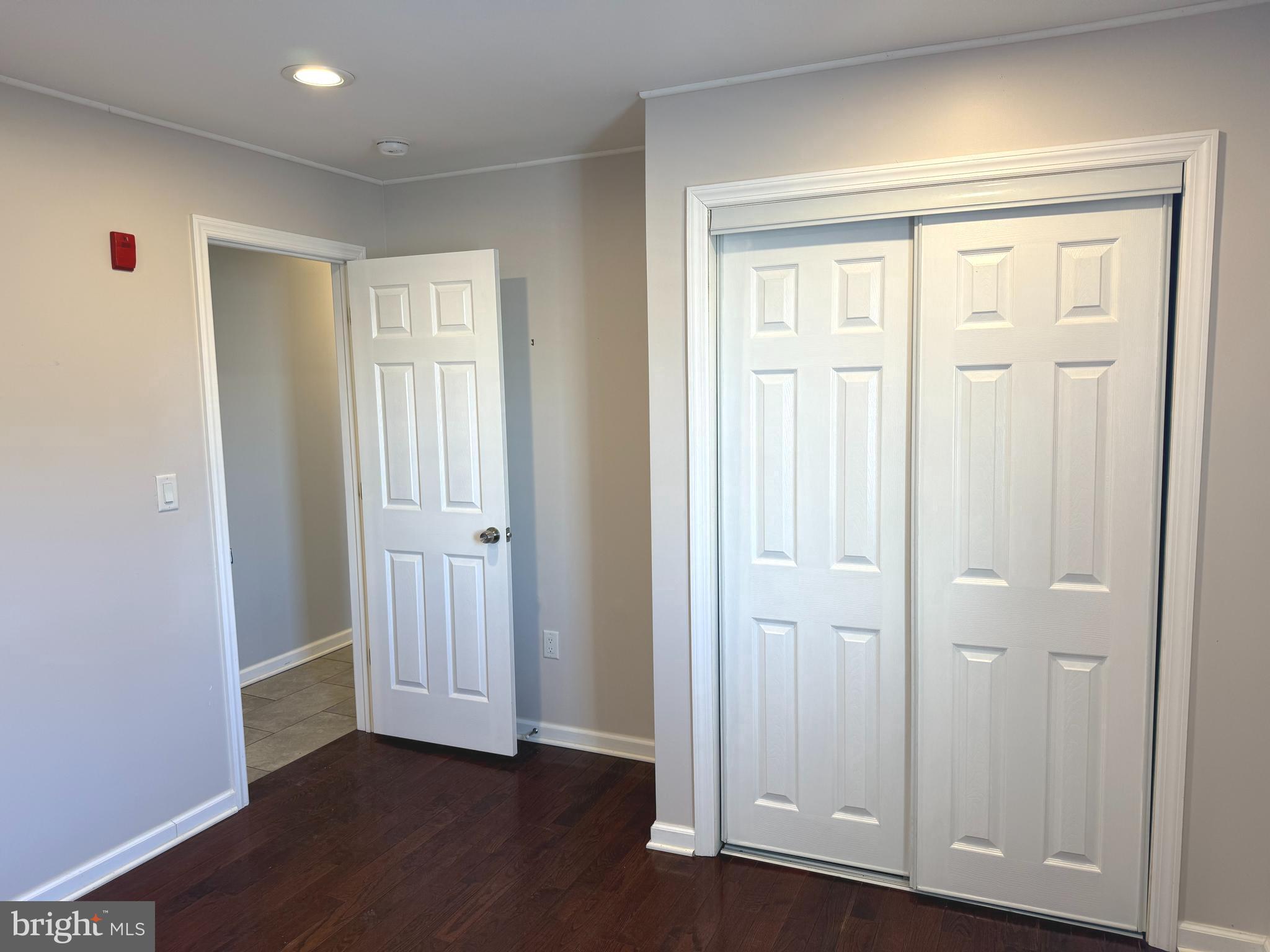 1512 West Shunk Street Philadelphia, PA 19145 - Photo 6 of 10 an empty room with wooden floor