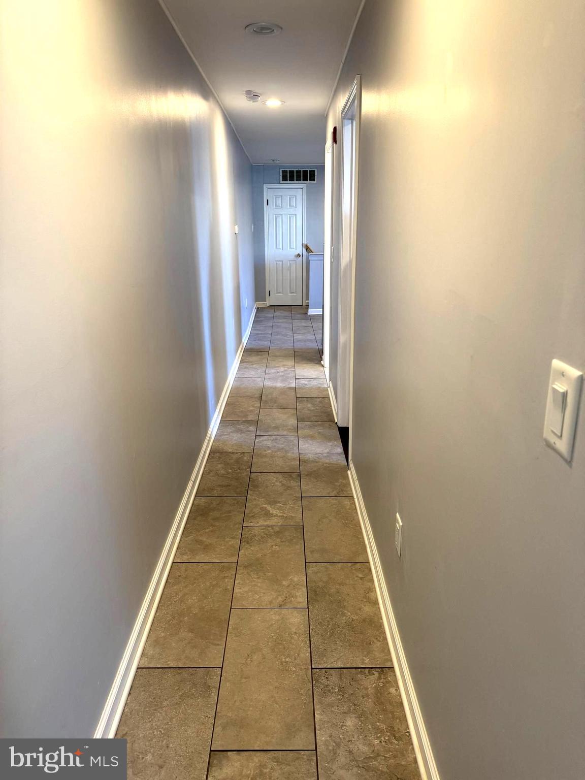 1512 West Shunk Street Philadelphia, PA 19145 - Photo 9 of 10 a view of hallway with a large window