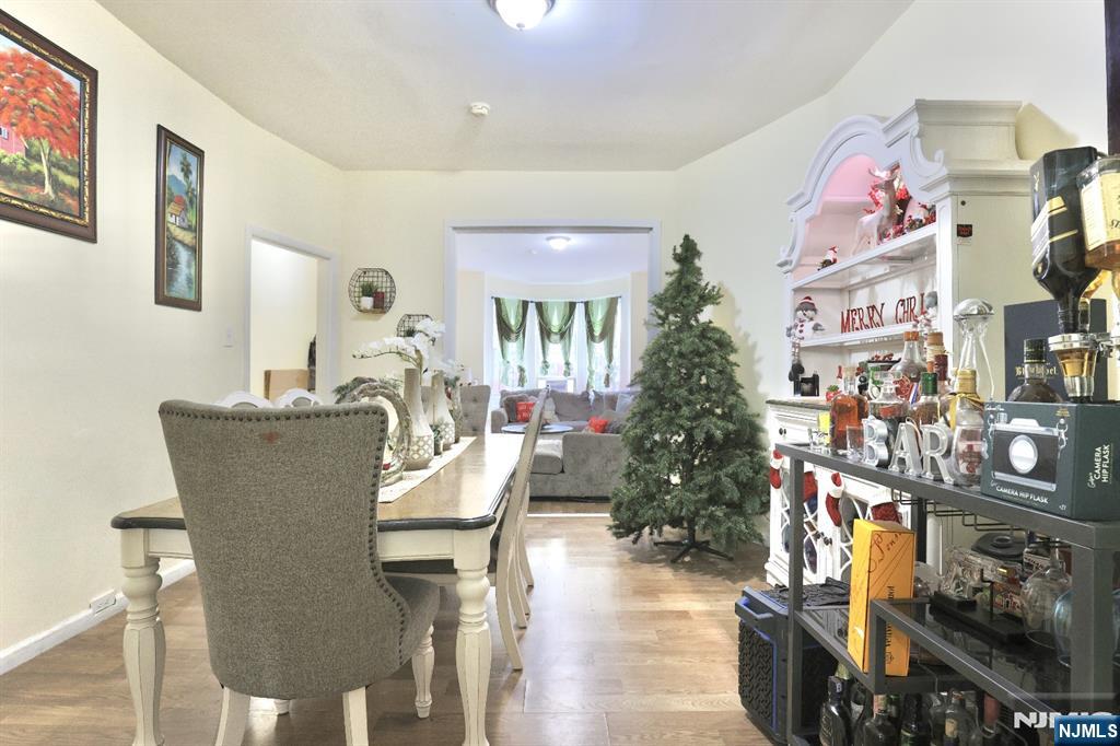 116 North 13th Street Newark, NJ 07107 - Photo 4 of 14 a dining room with furniture and chandelier
