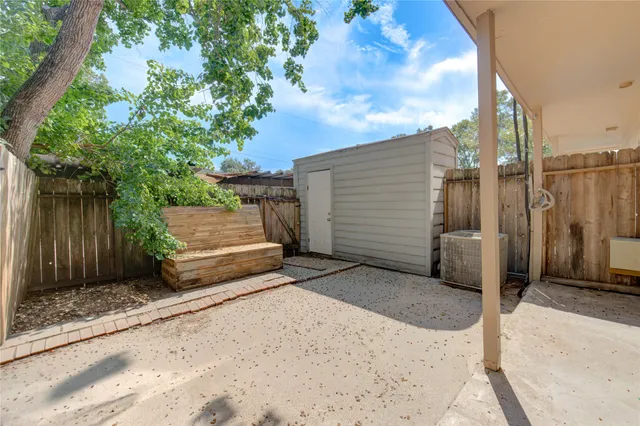 a view of street with parked cars