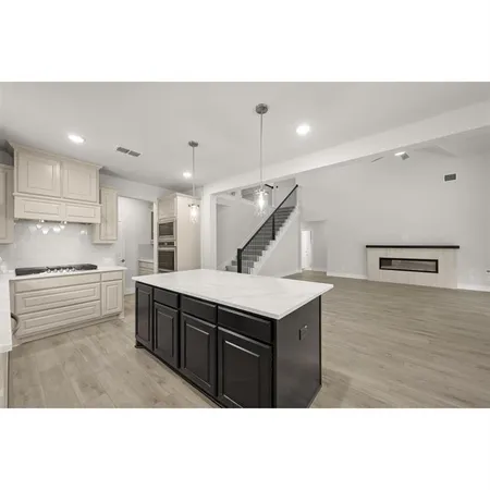 a living room with furniture and window