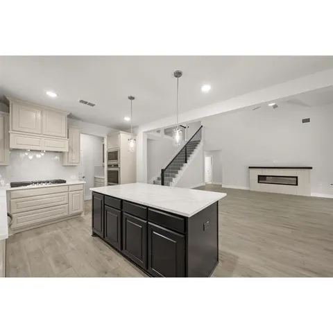 a living room with furniture and window