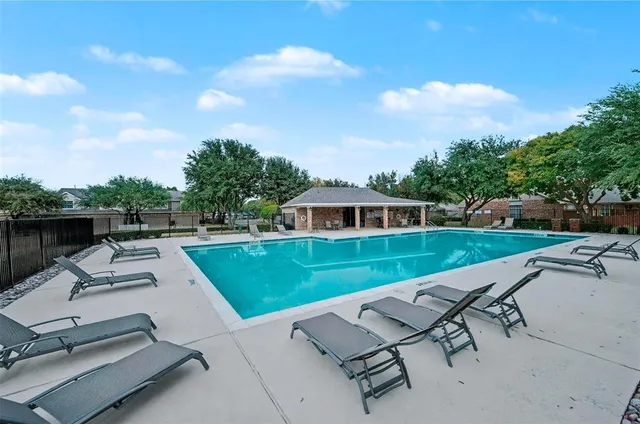 a view of a patio with a yard