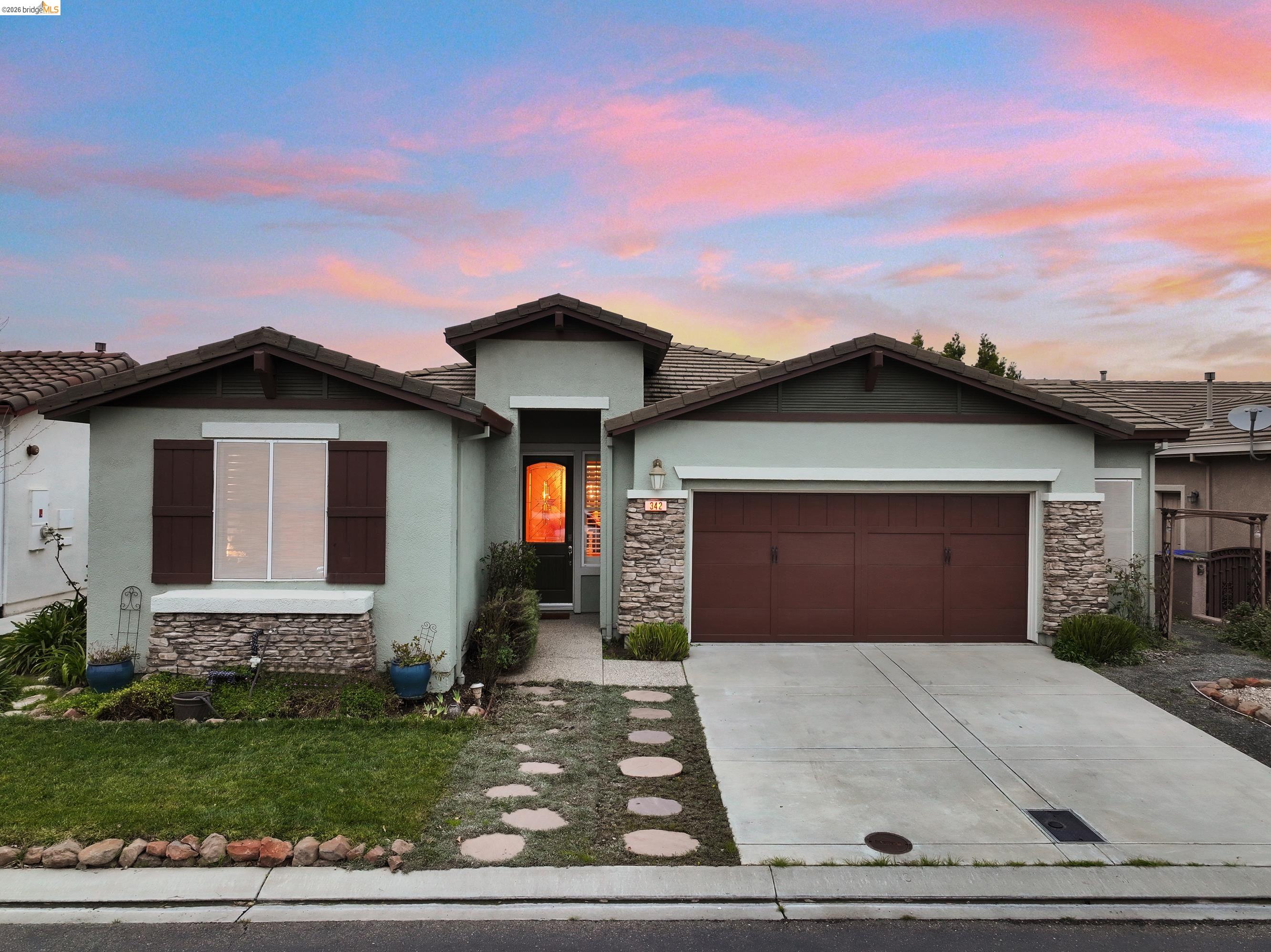 342 Desert Forest Court Rio Vista, CA 94571 - Photo 4 of 40 View of front of house featuring stone siding and a tiled roof