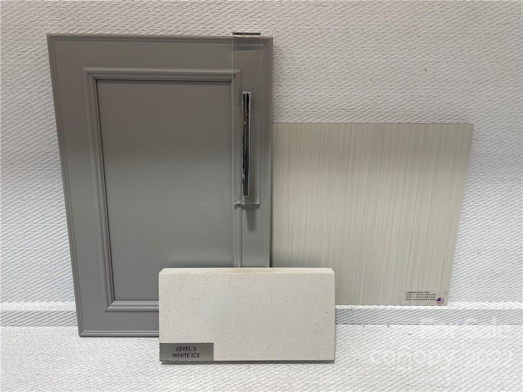 17138 Sand Bank Road, Unit 381 Charlotte, NC 28278 - Photo 5 of 8 a white bath tub sitting in a bathroom