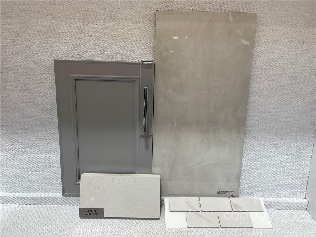 17138 Sand Bank Road, Unit 381 Charlotte, NC 28278 - Photo 7 of 8 a bathroom with a shower and bathtub