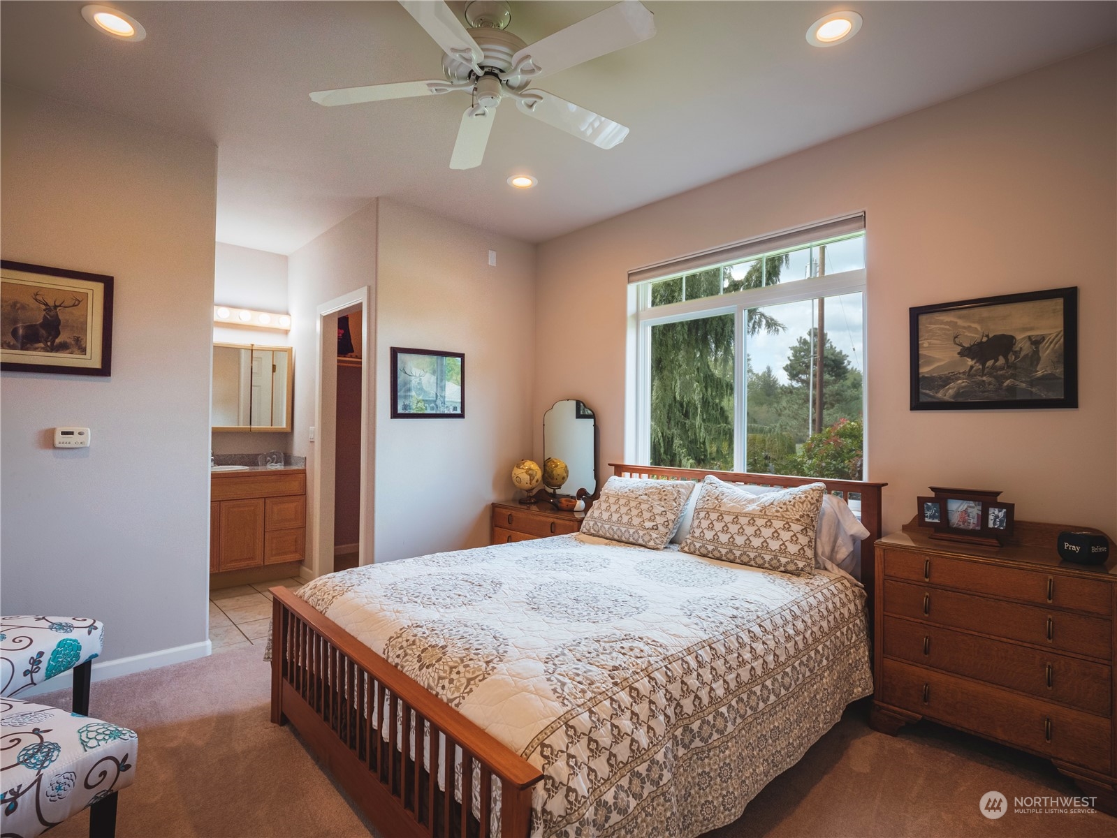 7801 Westlund Road Arlington, WA 98223 - Photo 17 of 39 a bedroom with a large bed and a window