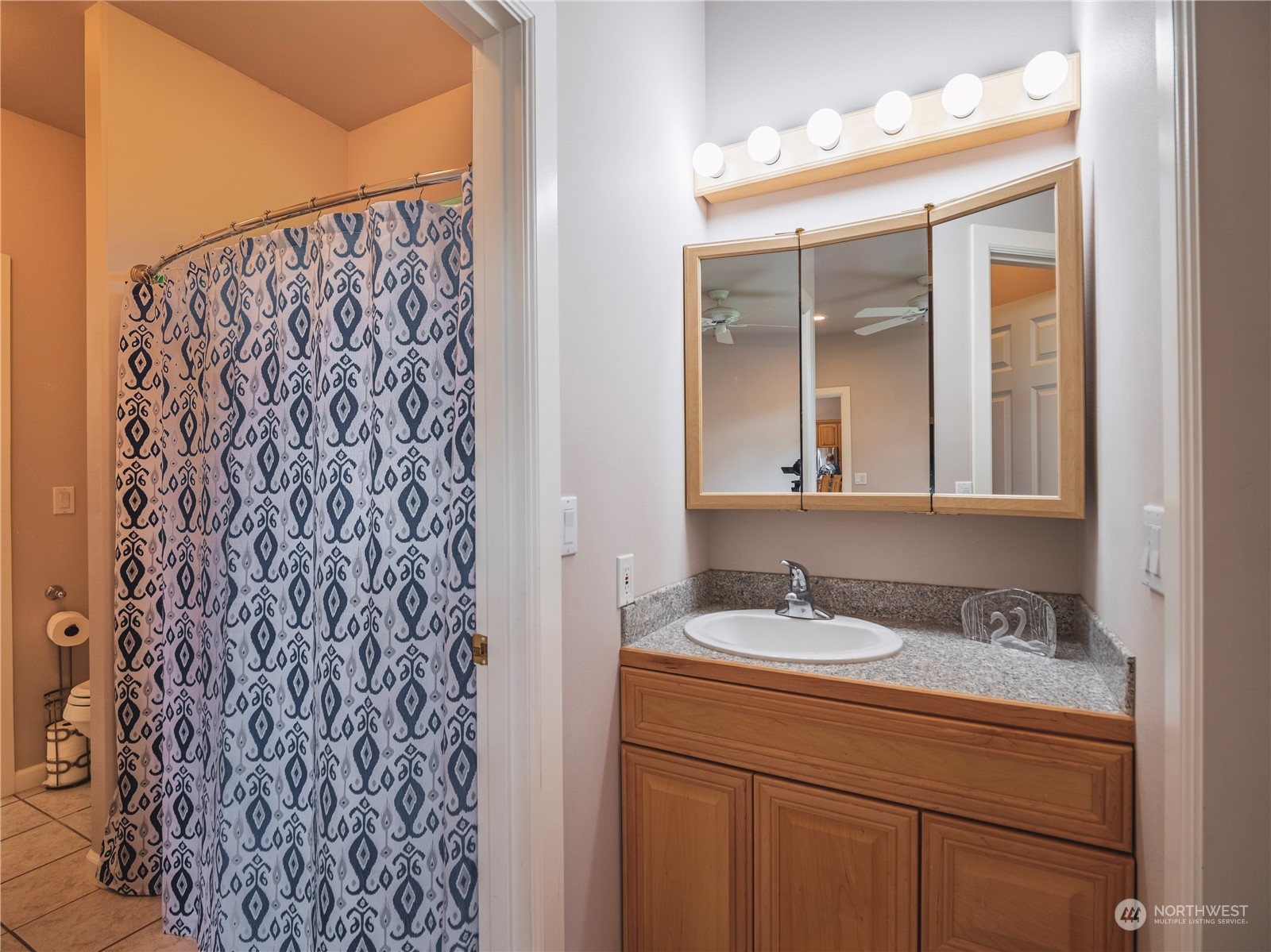 7801 Westlund Road Arlington, WA 98223 - Photo 18 of 39 a bathroom with a sink and a mirror