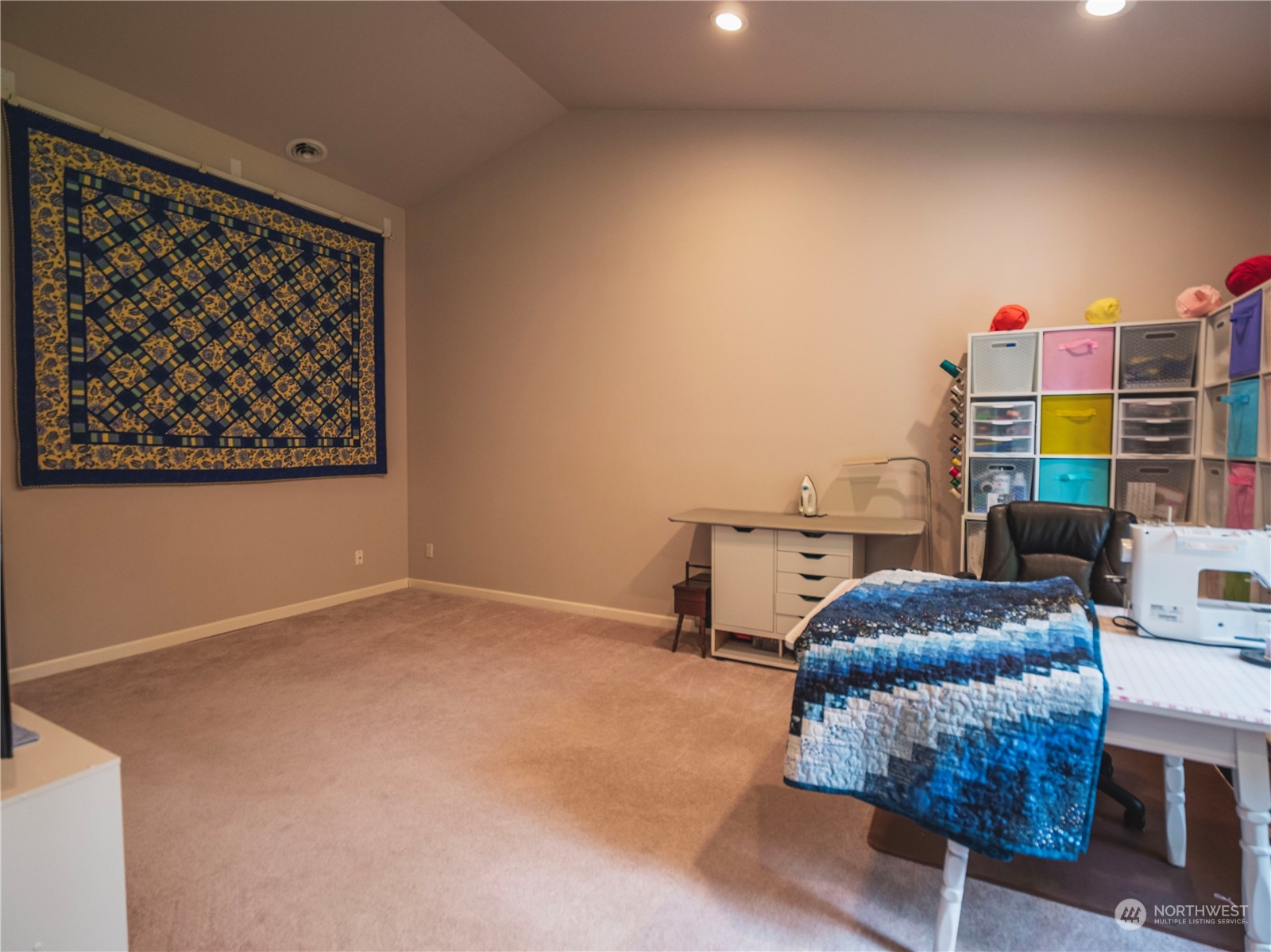 7801 Westlund Road Arlington, WA 98223 - Photo 20 of 39 a living room with furniture and a lamp