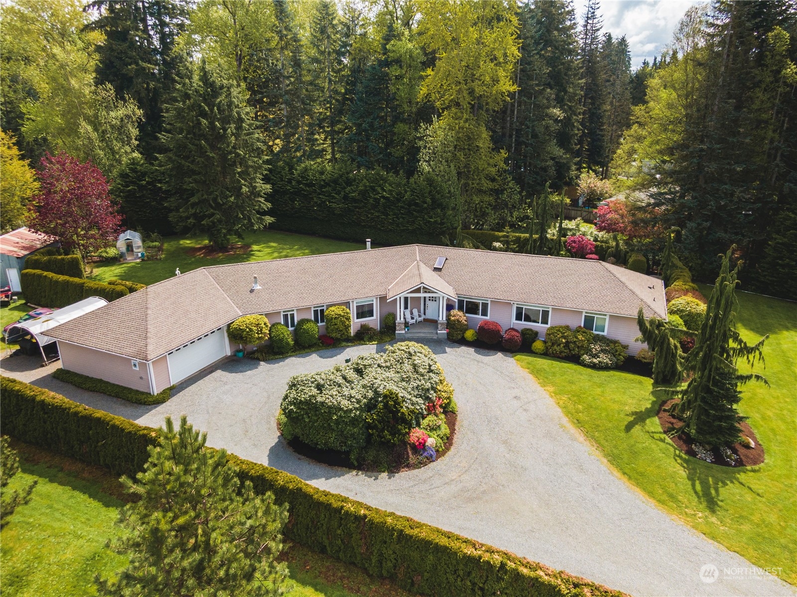 7801 Westlund Road Arlington, WA 98223 - Photo 2 of 39 an aerial view of a house with garden space and street view
