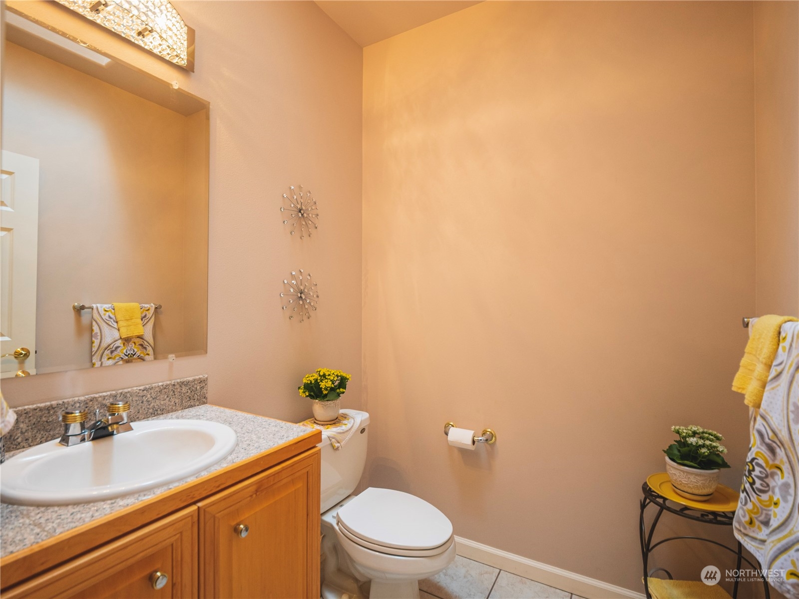 7801 Westlund Road Arlington, WA 98223 - Photo 22 of 39 a bathroom with a granite countertop sink and a toilet