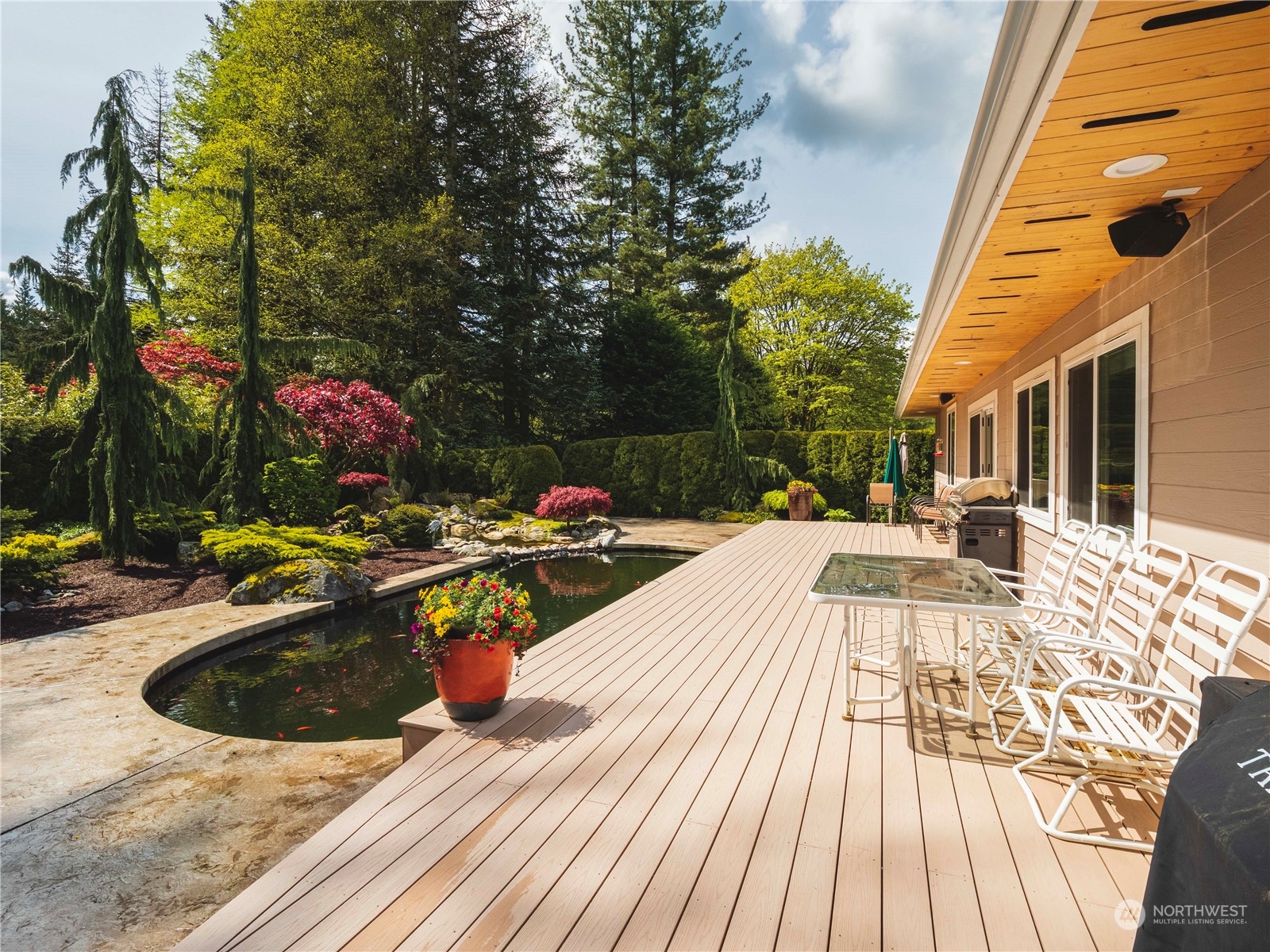 7801 Westlund Road Arlington, WA 98223 - Photo 23 of 39 a view of outdoor space yard deck patio and swimming pool
