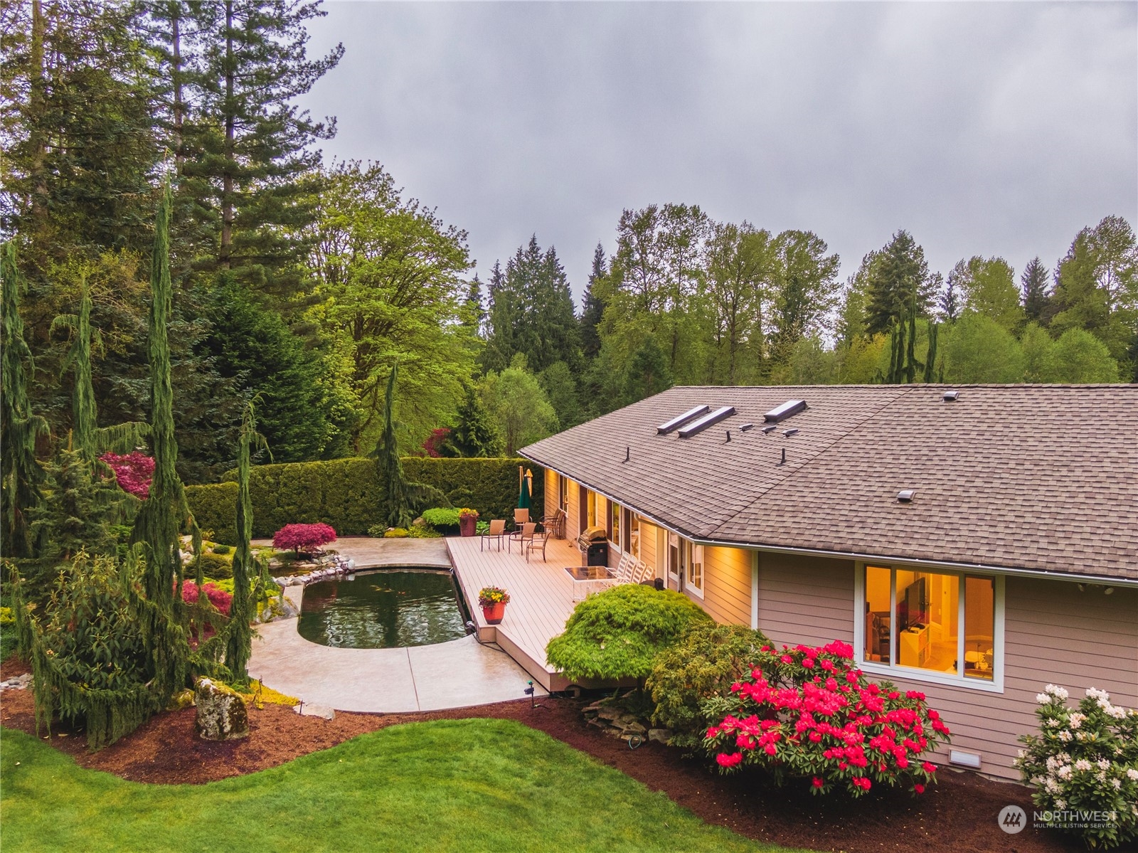 7801 Westlund Road Arlington, WA 98223 - Photo 37 of 39 a view of yard with outdoor seating and green space