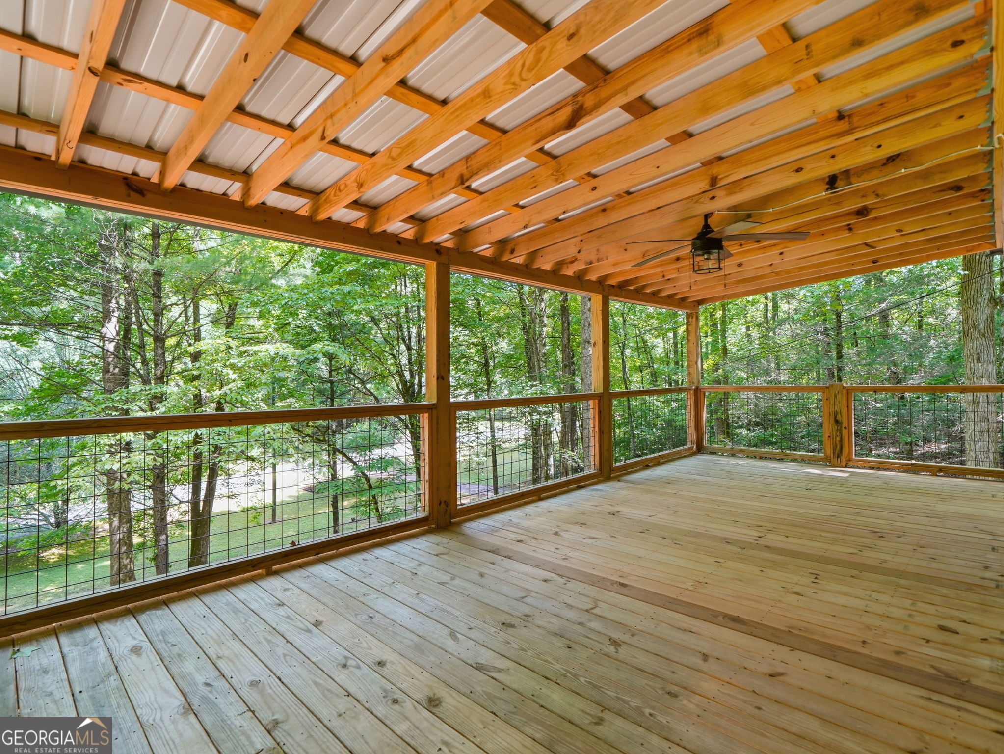 629 Goose Island Road Cherry Log, GA 30522 - Photo 40 of 52 a view of porch with wooden floor