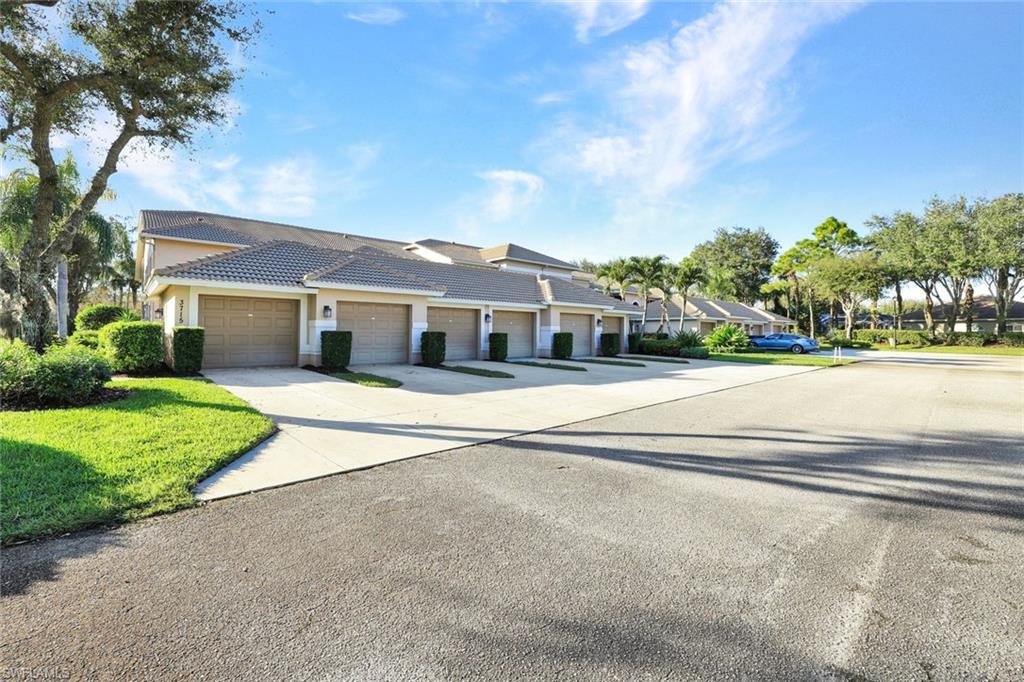 3715 Buttonwood Way, Unit 1722 Naples, FL 34112 - Photo 23 of 29 One Car Garage