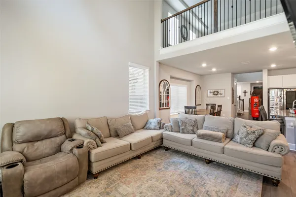 a living room with furniture and a couch