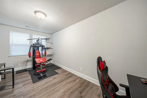a view of a room with gym equipment