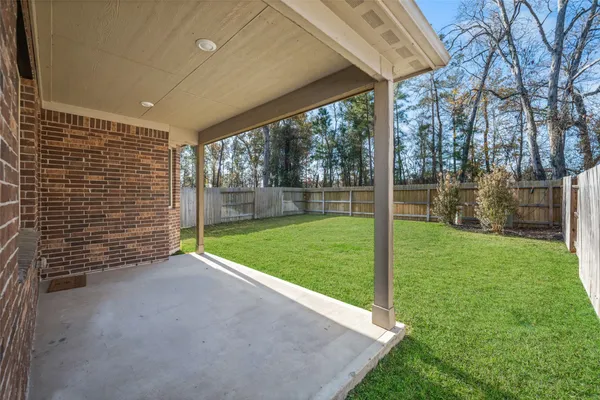 a view of a porch with a backyard
