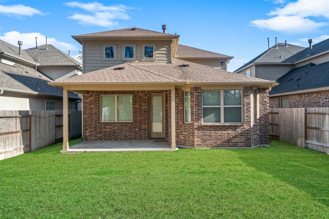 27479 Vivace Drive Spring, TX 77386 - Photo 23 of 25 a view of a house with a yard and front view