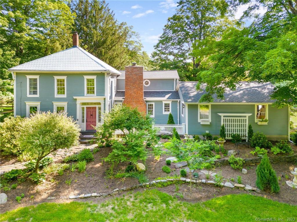 46 Simsbury Road Granby, CT 06090 - Photo 1 of 1 a front view of a house with a garden