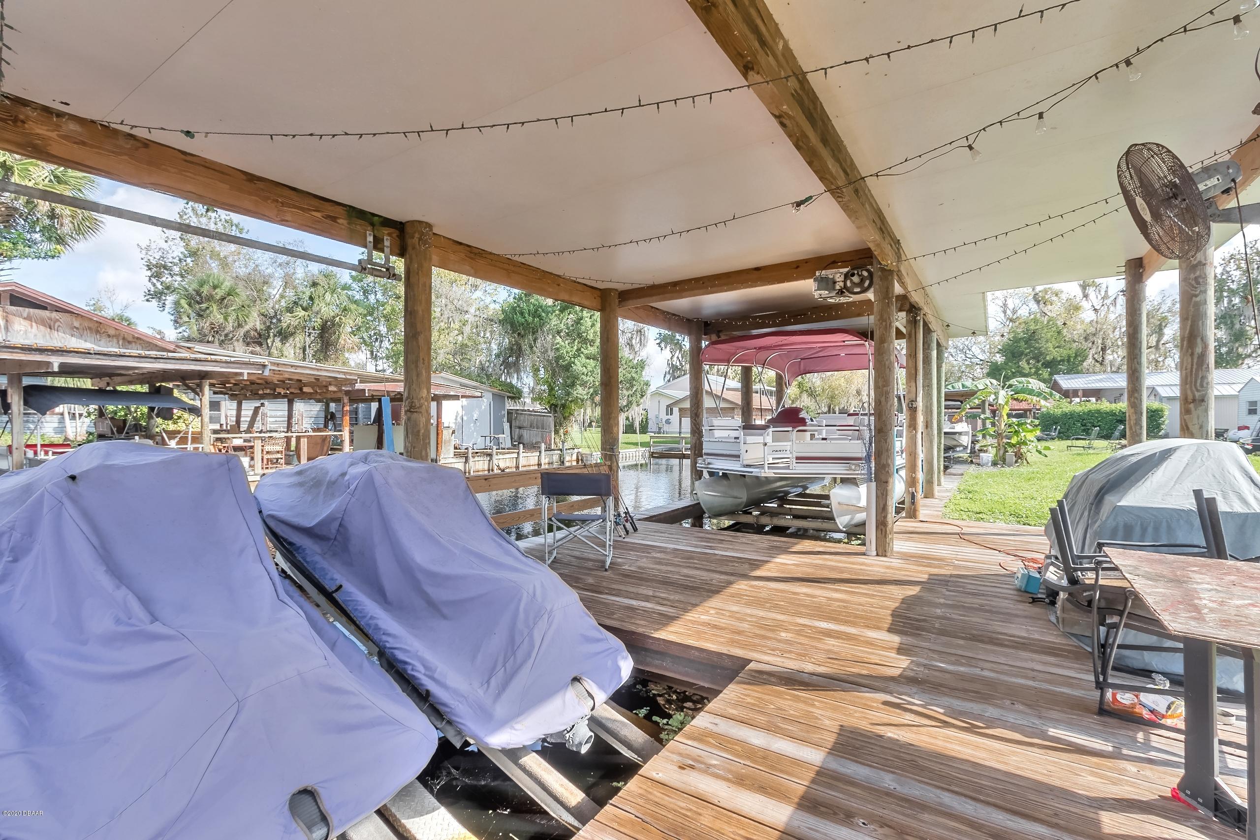 24513 Snail Road Astor, FL 32102 - Photo 31 of 40 a view of porch with seating space