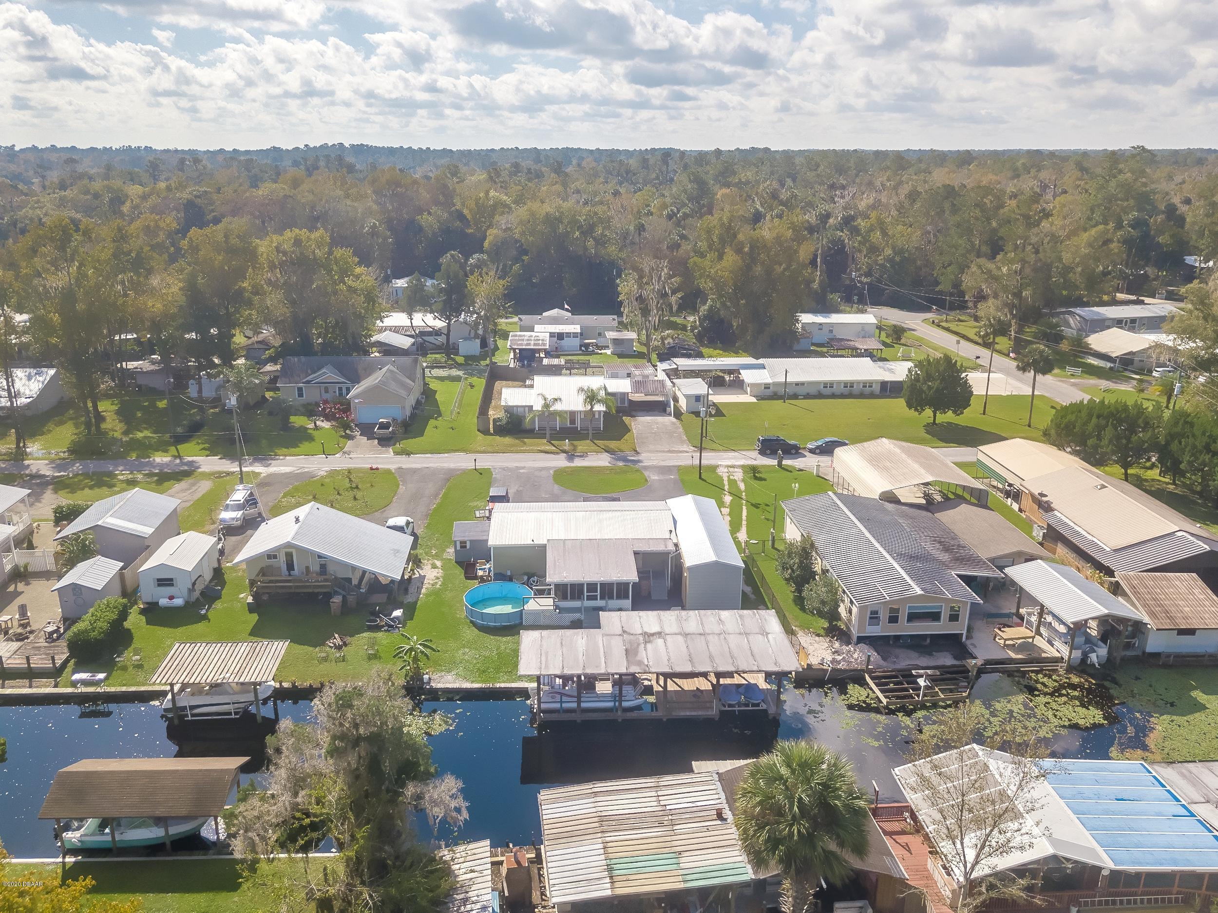 24513 Snail Road Astor, FL 32102 - Photo 38 of 40 a picture of city view with lake view