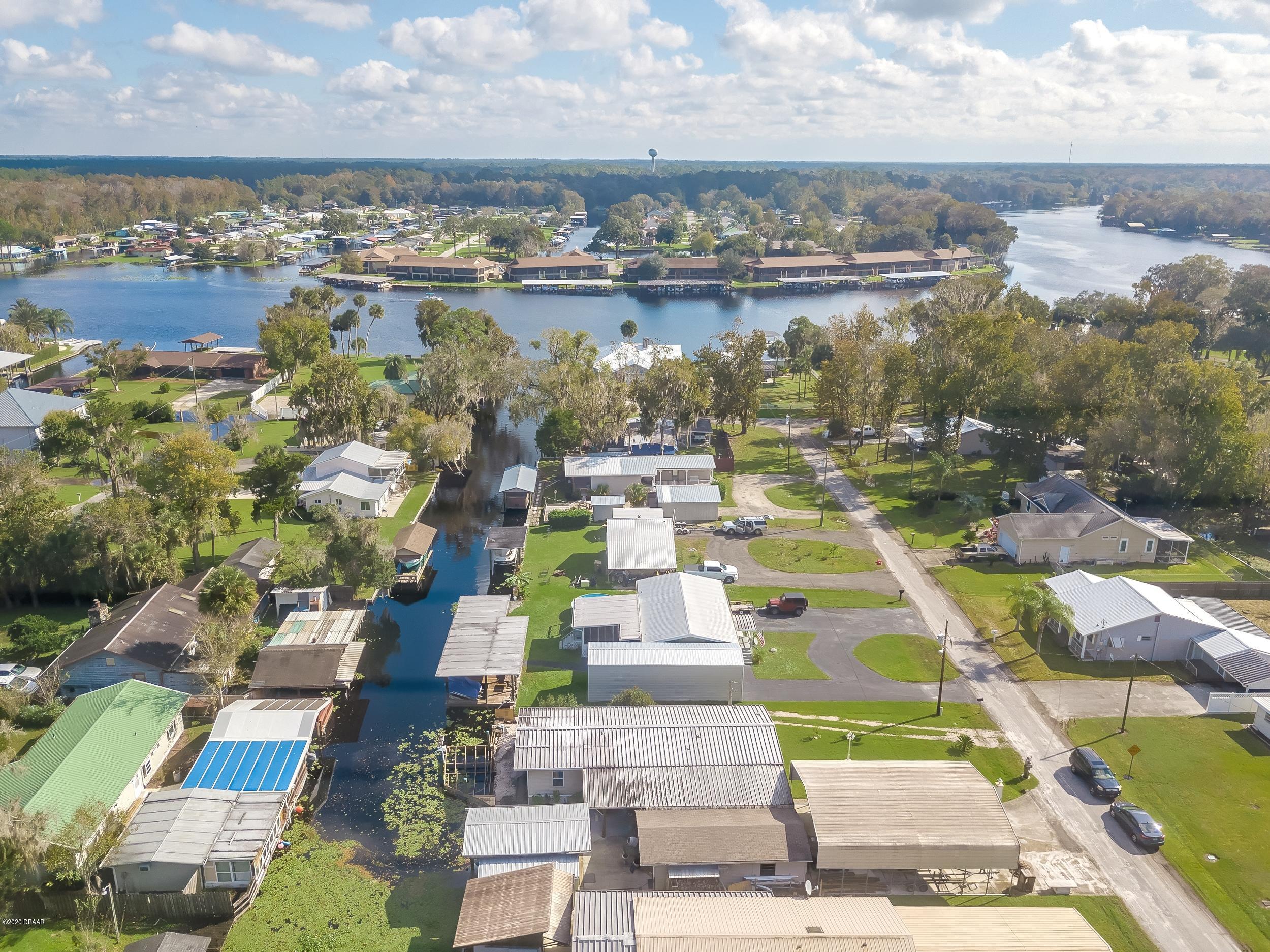 24513 Snail Road Astor, FL 32102 - Photo 39 of 40 a view of a city with ocean view