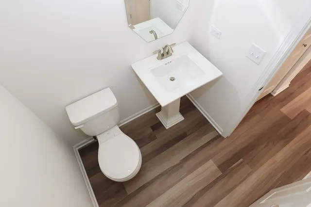 a bathroom with a sink and mirror