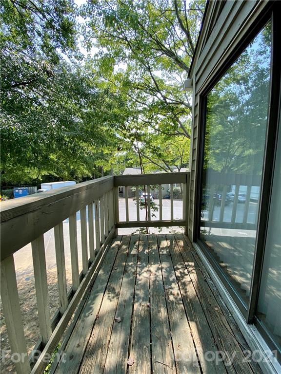 1604 Sharon Road West Charlotte, NC 28210 - Photo 9 of 15 a view of balcony with wooden floor