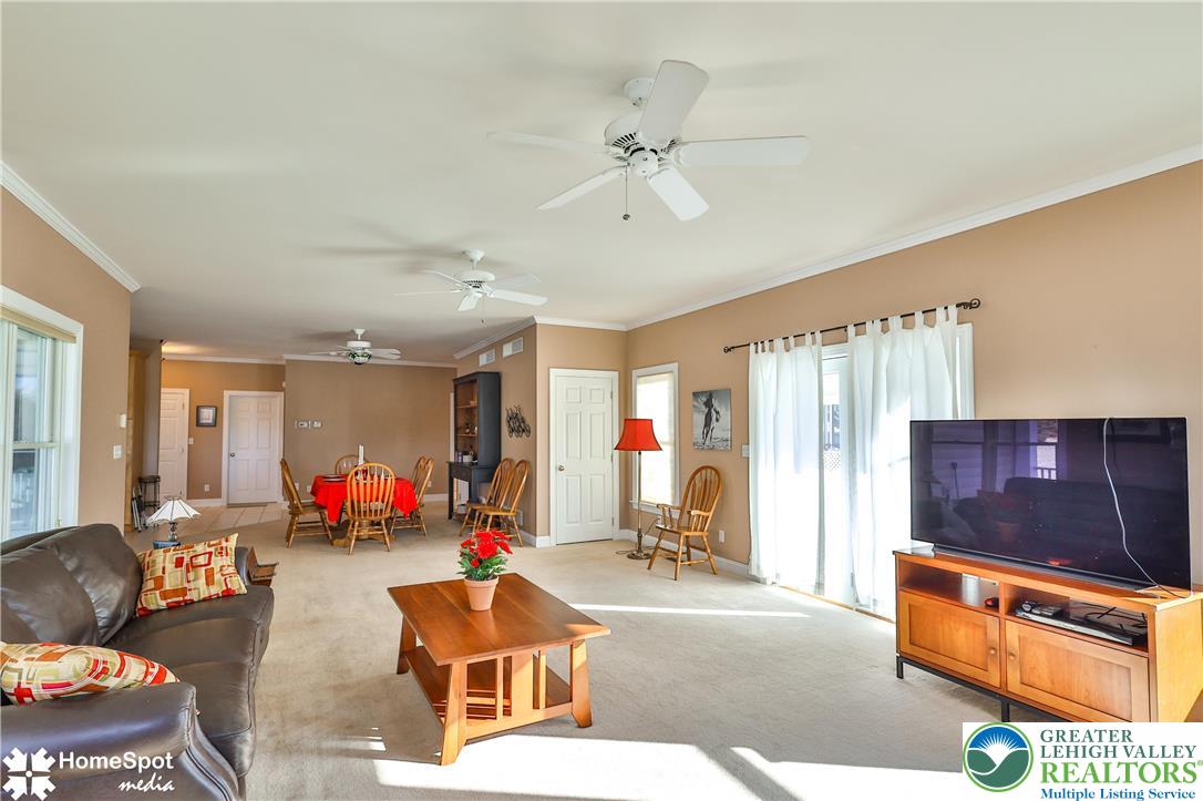 5500 Ayers Road Easton, PA 18040 - Photo 11 of 56 a living room with furniture and a flat screen tv