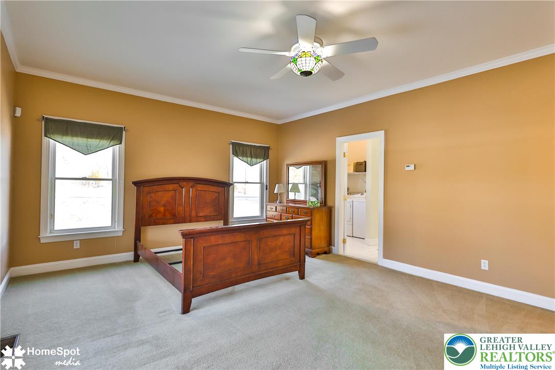 5500 Ayers Road Easton, PA 18040 - Photo 14 of 56 a living room with furniture and a chandelier